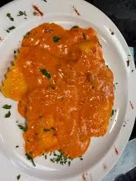 Heart shaped Ravioli in tomato sauce - frozen